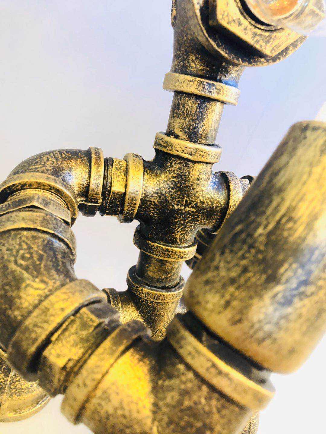 Industrial-style table lamp, personalized and creative decoration, coffee shop and bar table lamp, led retro and creative robot water pipe table lamp Specification image