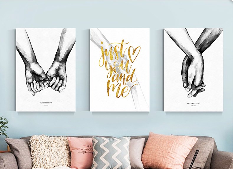 Modern three-panel wall mural in a minimalist living room setting
