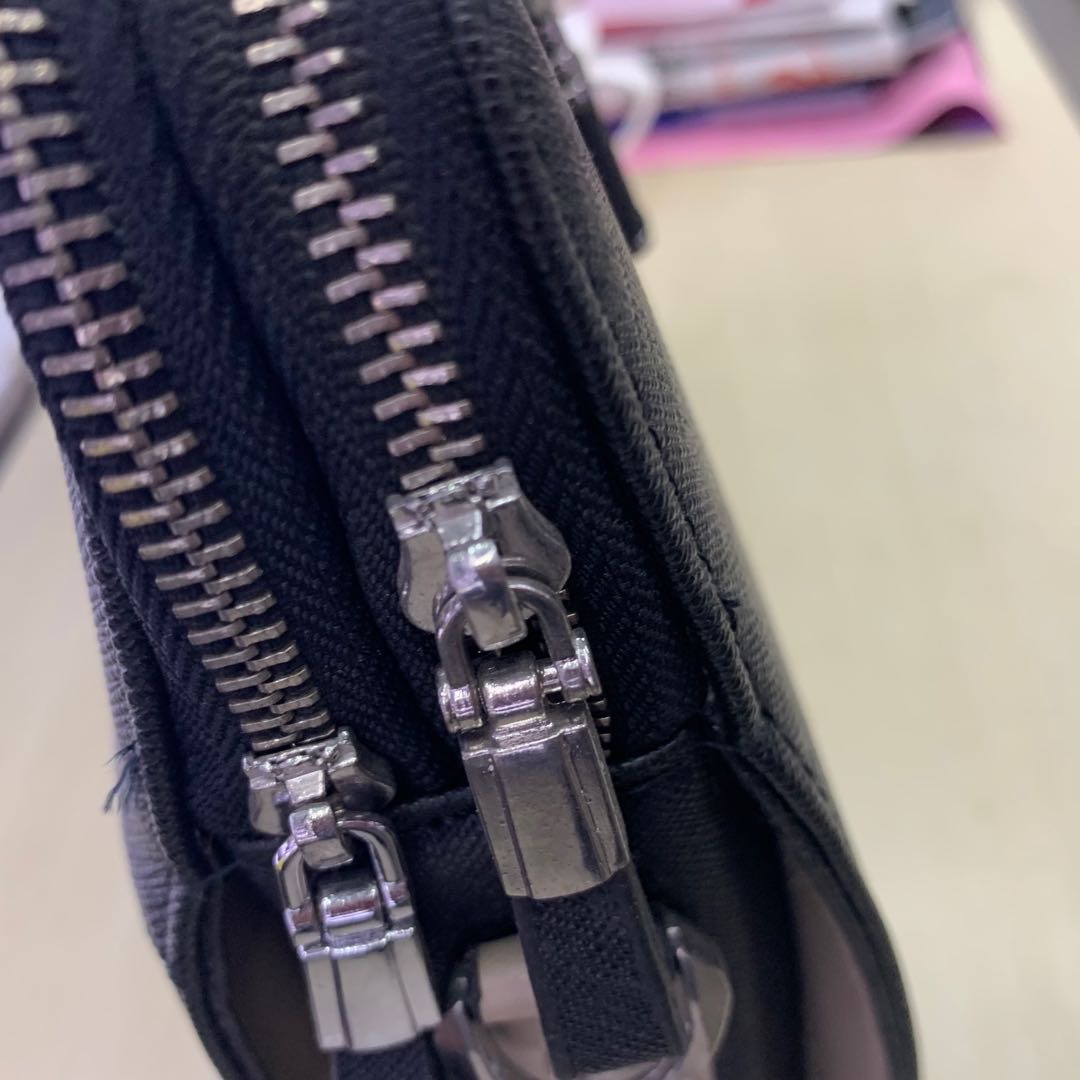 高档时尚PU皮男士斜挎手提多功能包细节图