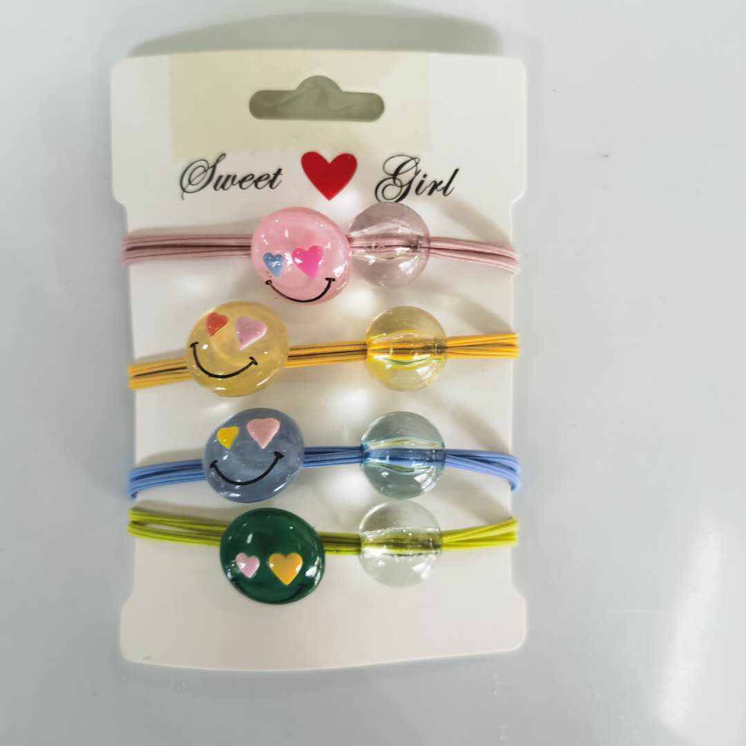 A new Korean-style fashionable and stylish ladies' hair band with a smiling face and candy color, featuring a fresh and clean leather band details Picture