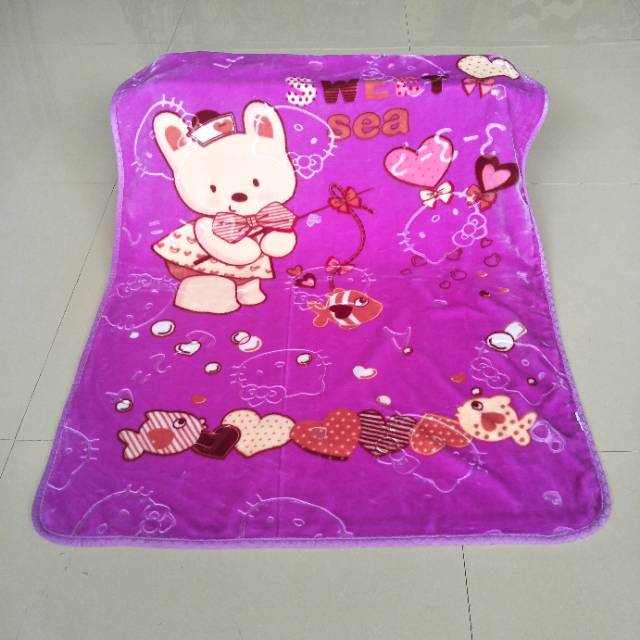 Koala Bear Blanket used as a play mat with toys