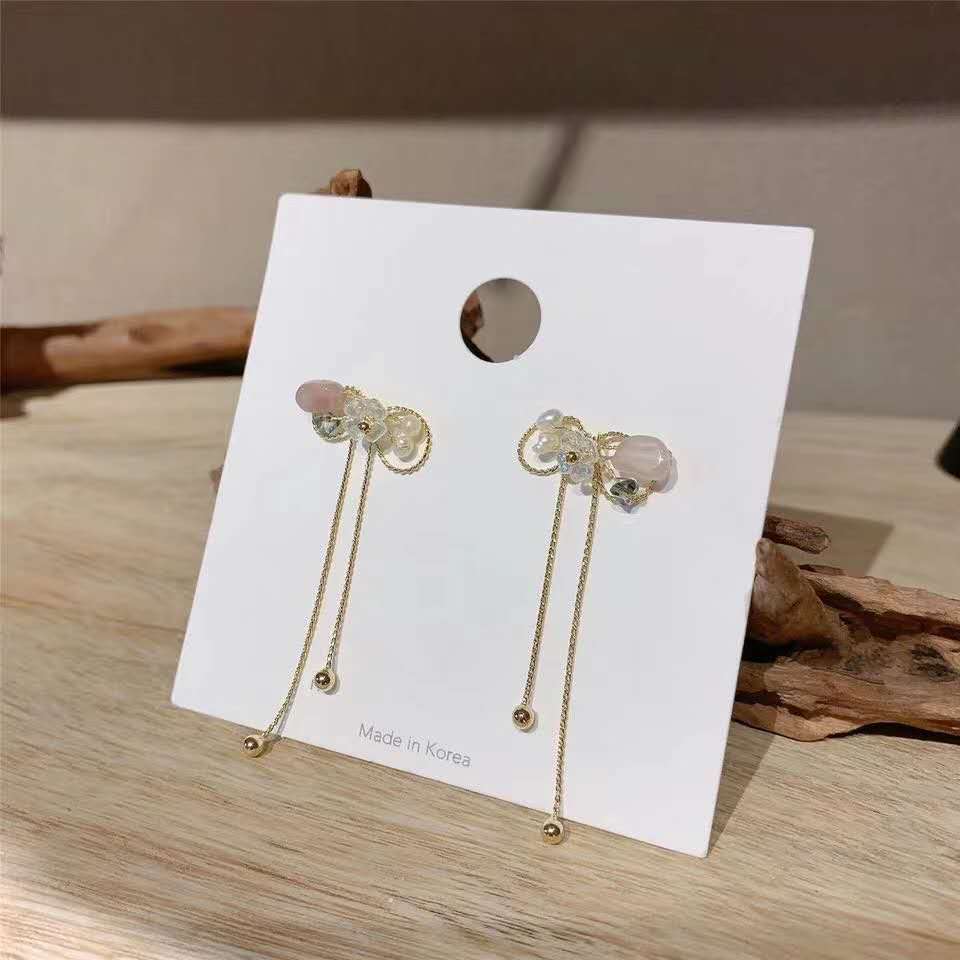 Korean fashion trend: Golden bow-encrusted pearl gemstone small flower girl's elegant earrings