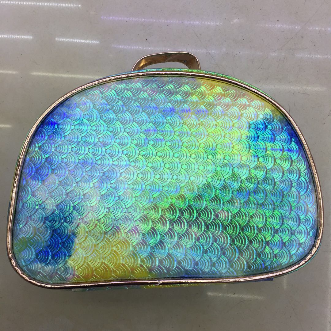 Transparent Laser Jelly Makeup Bag with Makeup Items Inside
