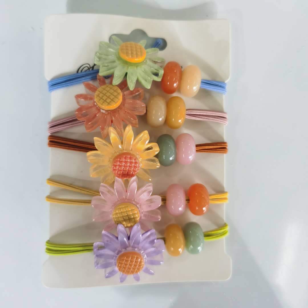 A new Korean-style fashionable ladies' hair band in candy color with a fresh and delicate sunflower band details Picture
