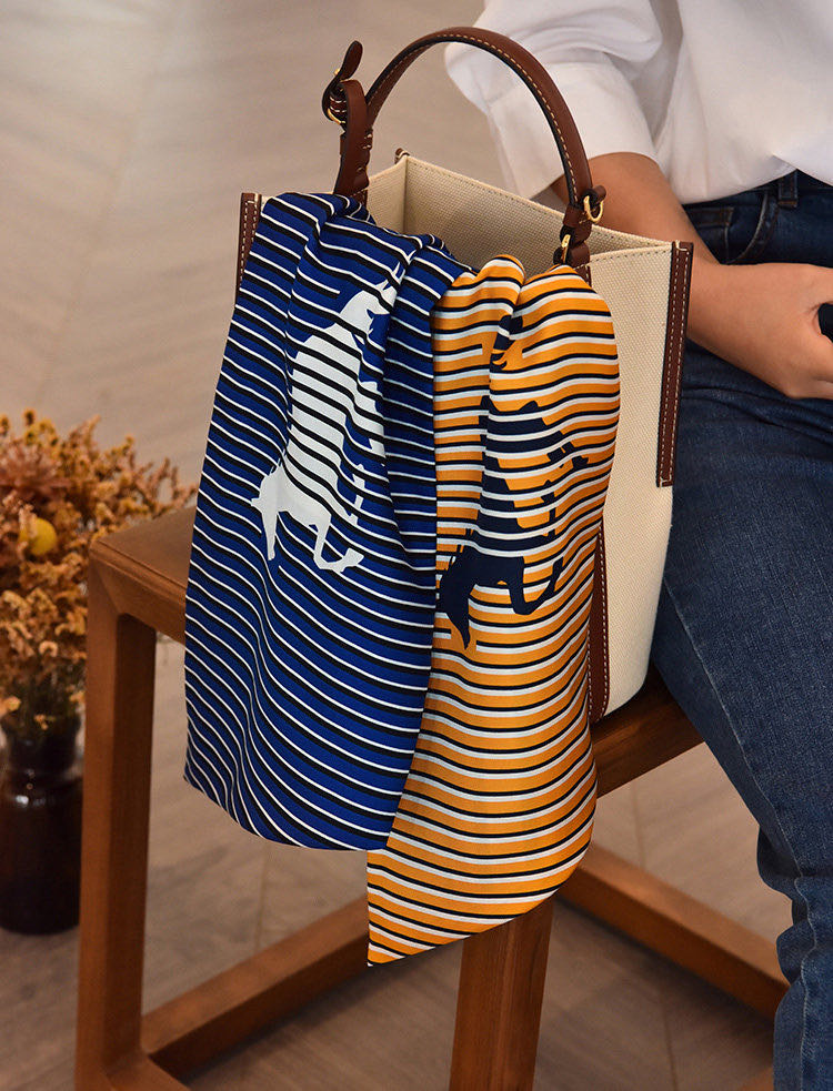 A casual, fashionable and trendy blue pleated long scarf that goes well with all kinds of outfits