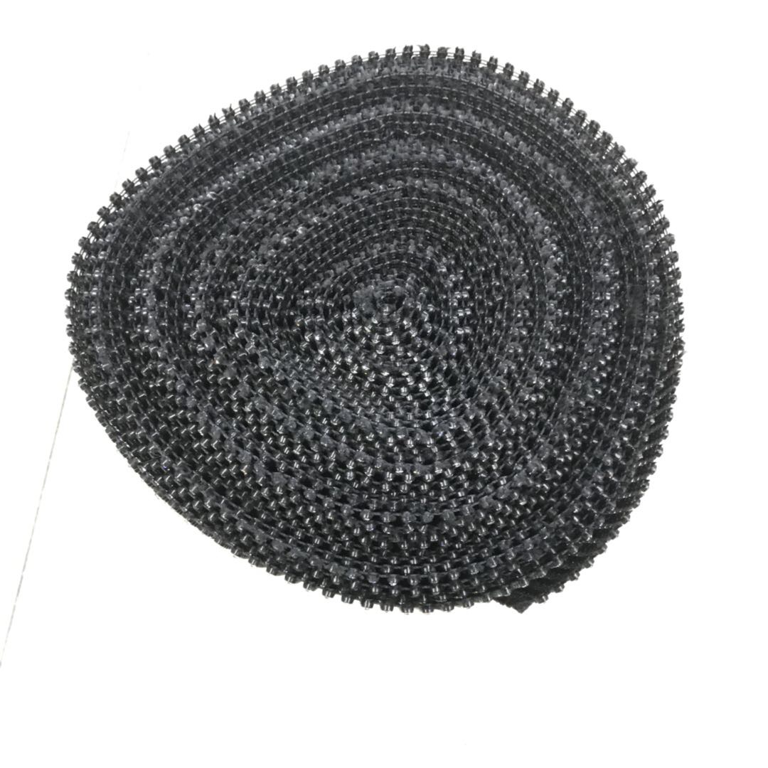 The black base of the dress is decorated with small silver rhinestones details Picture