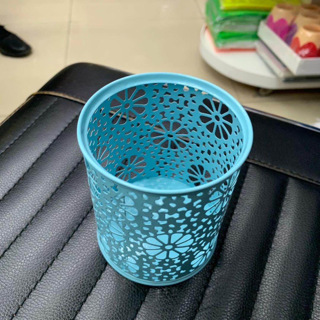 Blue hollowed-out pen holders for office supplies and stationery details Picture