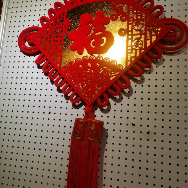 Red Fu Tassel in a Festive Living Room