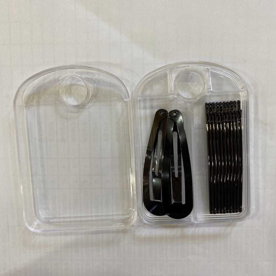 A transparent small box with a black bb holder and a straight clip set details Picture