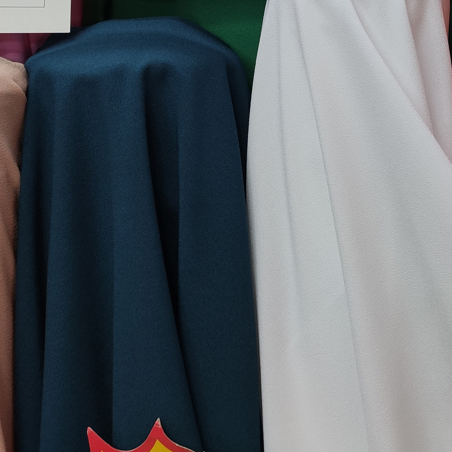 The elastic crepe fabric for clothing is available in multiple colors and the price is negotiable