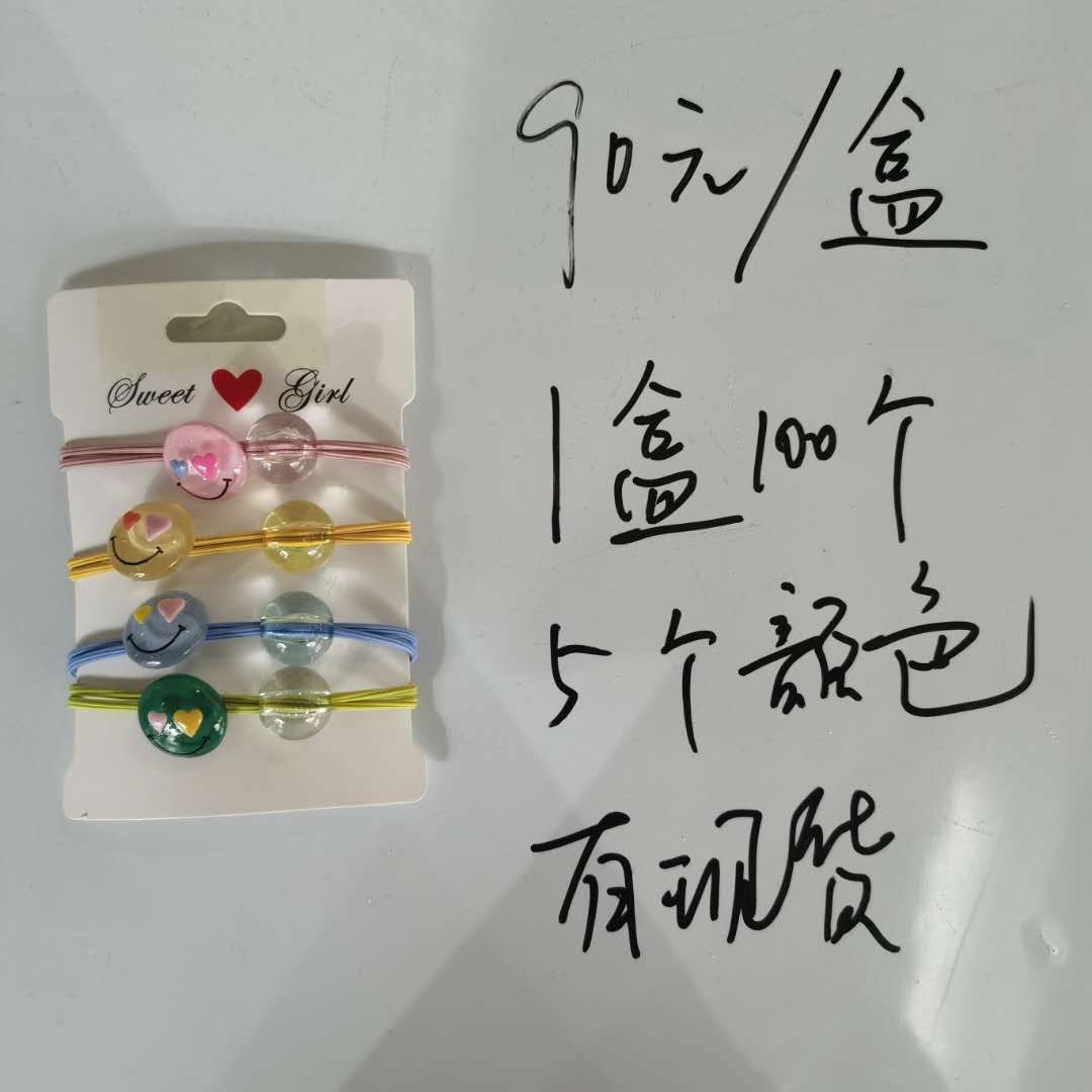 A new Korean-style fashionable and stylish ladies' hair band with a smiling face and candy color, featuring a fresh and clean leather band