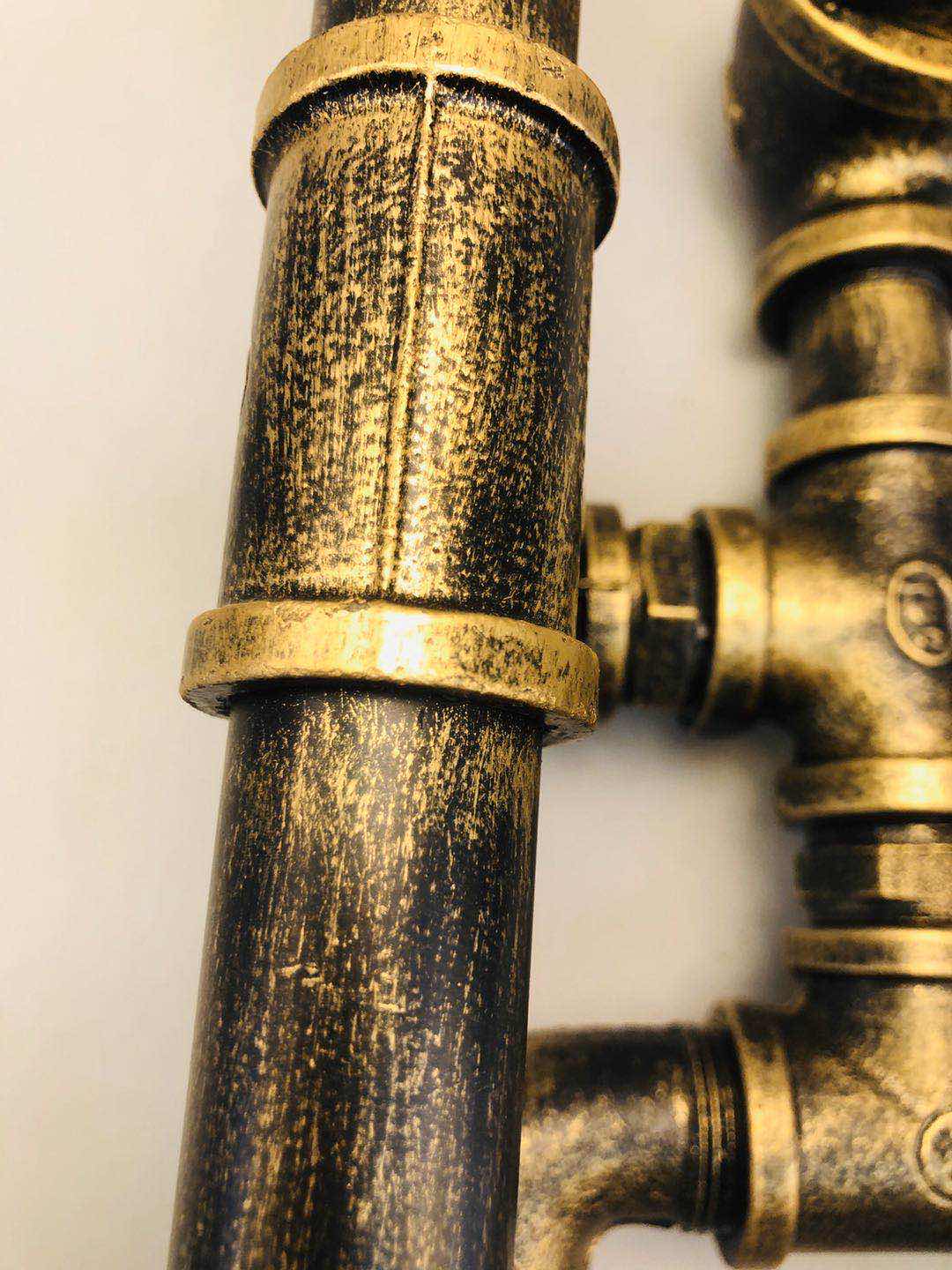 Industrial-style table lamp, personalized and creative decoration, coffee shop and bar table lamp, led retro and creative robot water pipe table lamp Specification image