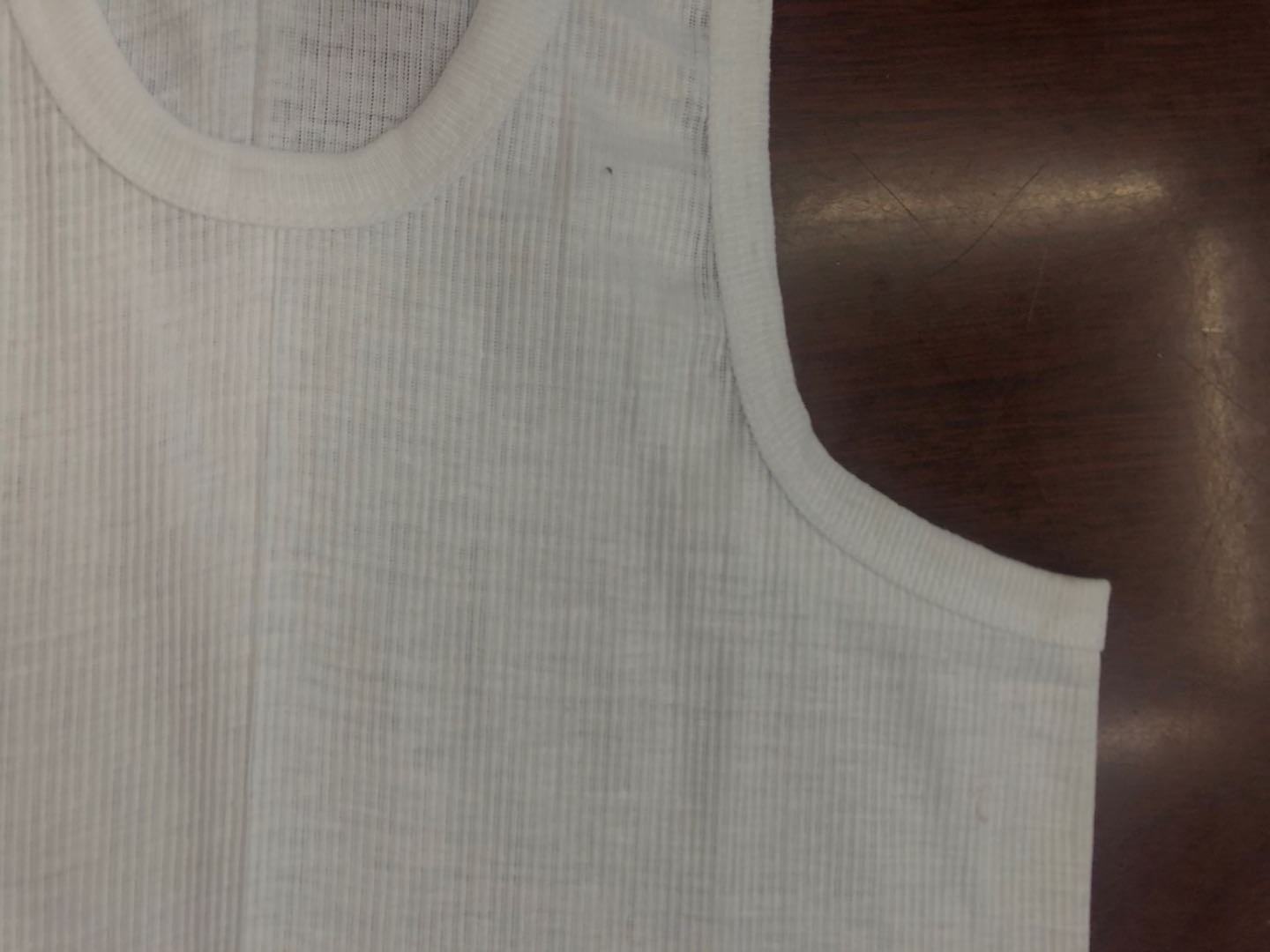 fine thread sewing process under close-up lens shows quality details and controls