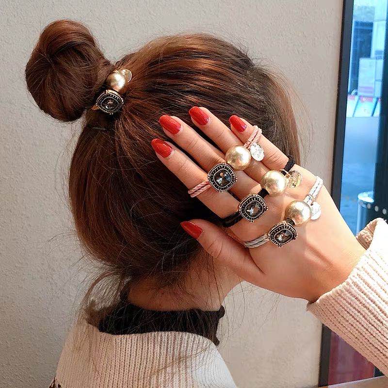 Primavera nuevo estilo completo de diamantes de oro perla cuerda de pelo mujer simple temperamento adulto atadura de cabeza banda de cuero de alta estiramiento grosor anillo de pelo tiara Specification image