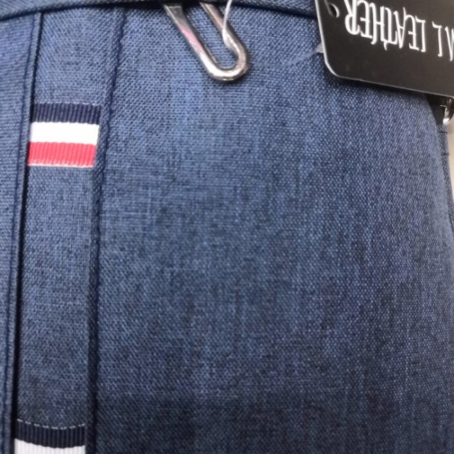 浅蓝色帆布包双肩包运动背包细节图