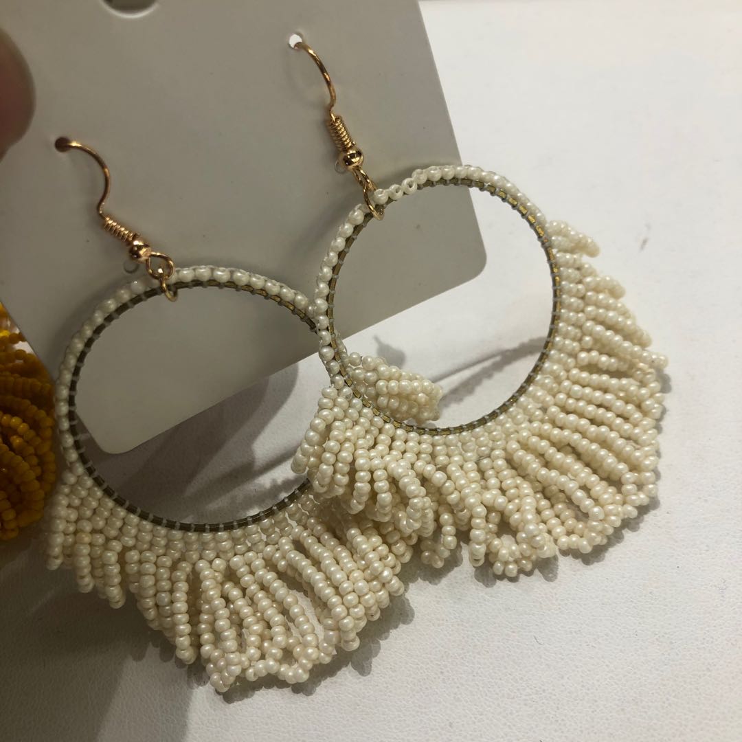 New stylish earrings with a hollow ring design and tassel from Japan and South Korea, a versatile and trendy accessory Specification image