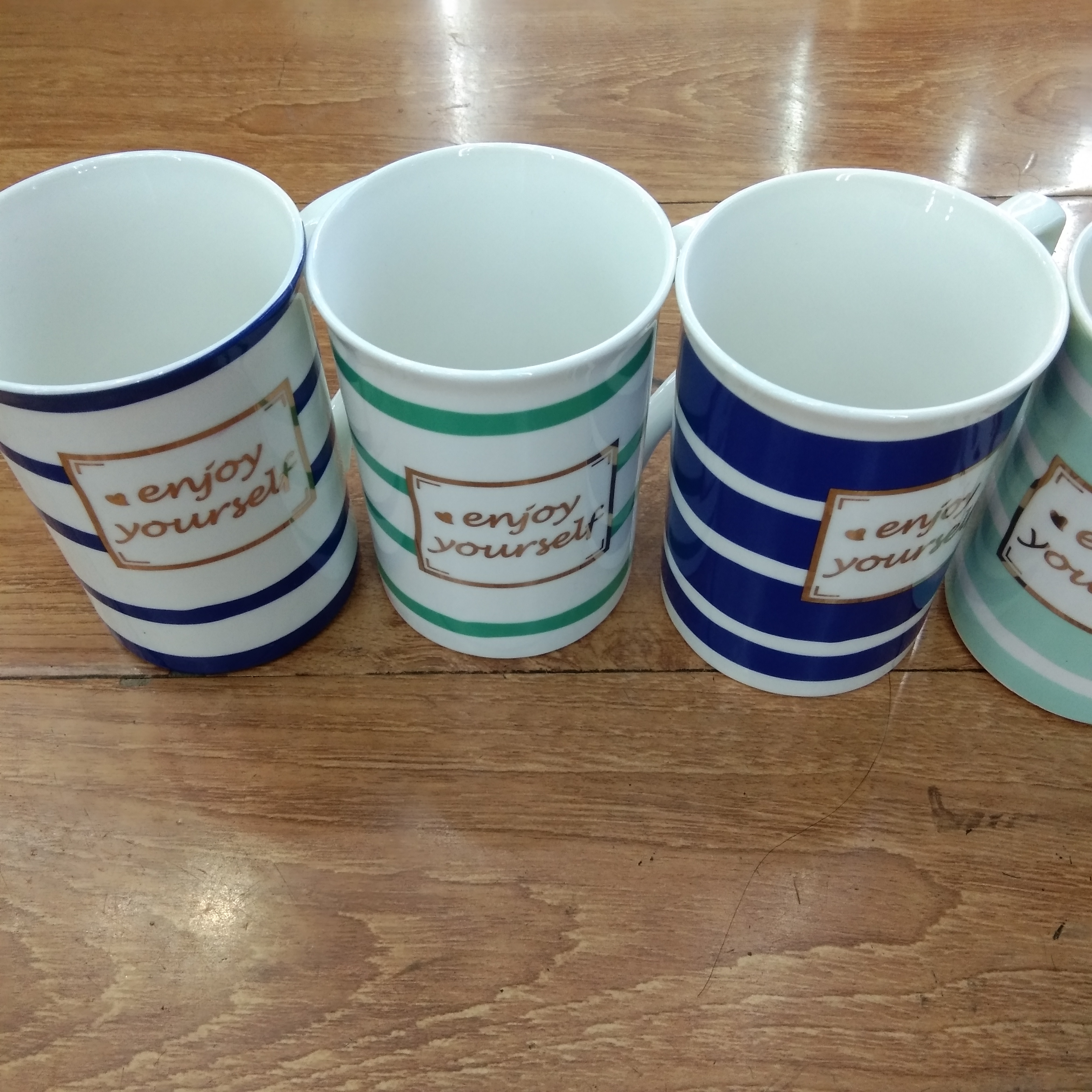 Wholesale of ceramic striped letter cups, creative mugs and various household cups Specification image