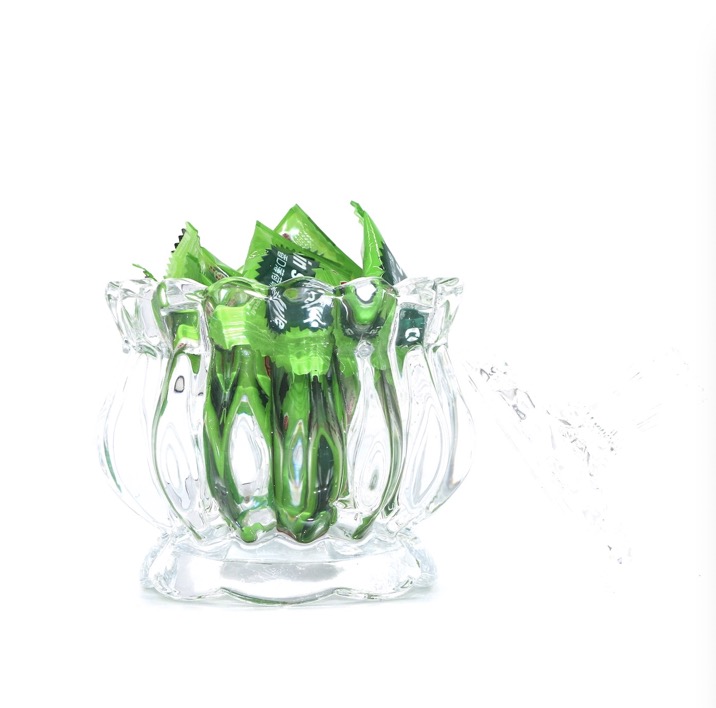A transparent glass sugar jar with a lid details Picture