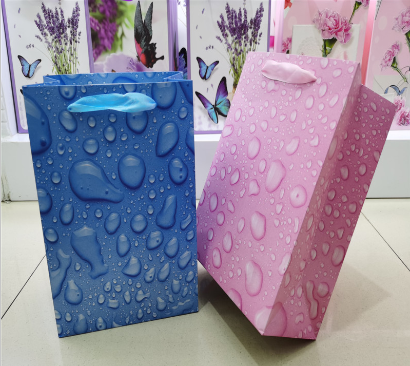 Raindrop gift handbag, UV gift bag, water drop hand-held paper bag, dew shopping clothing bag customization Specification drawing