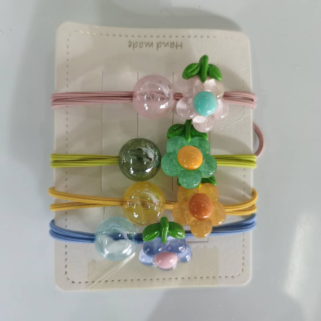 A new Korean-style fashionable ladies' versatile hair band in sunflower candy color with elastic bands details Picture