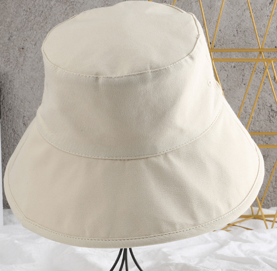 Close-up of embroidered Japanese characters on hat
