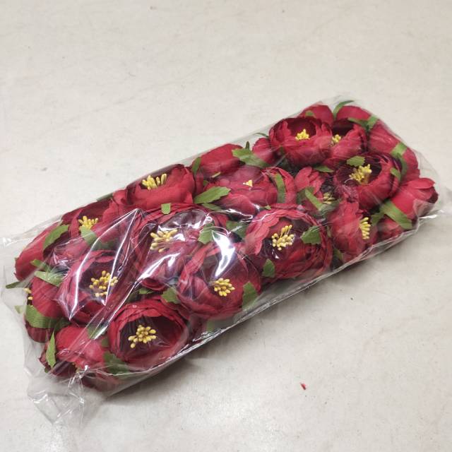 Artificial flowers decorated with red heart flowers thumbnail