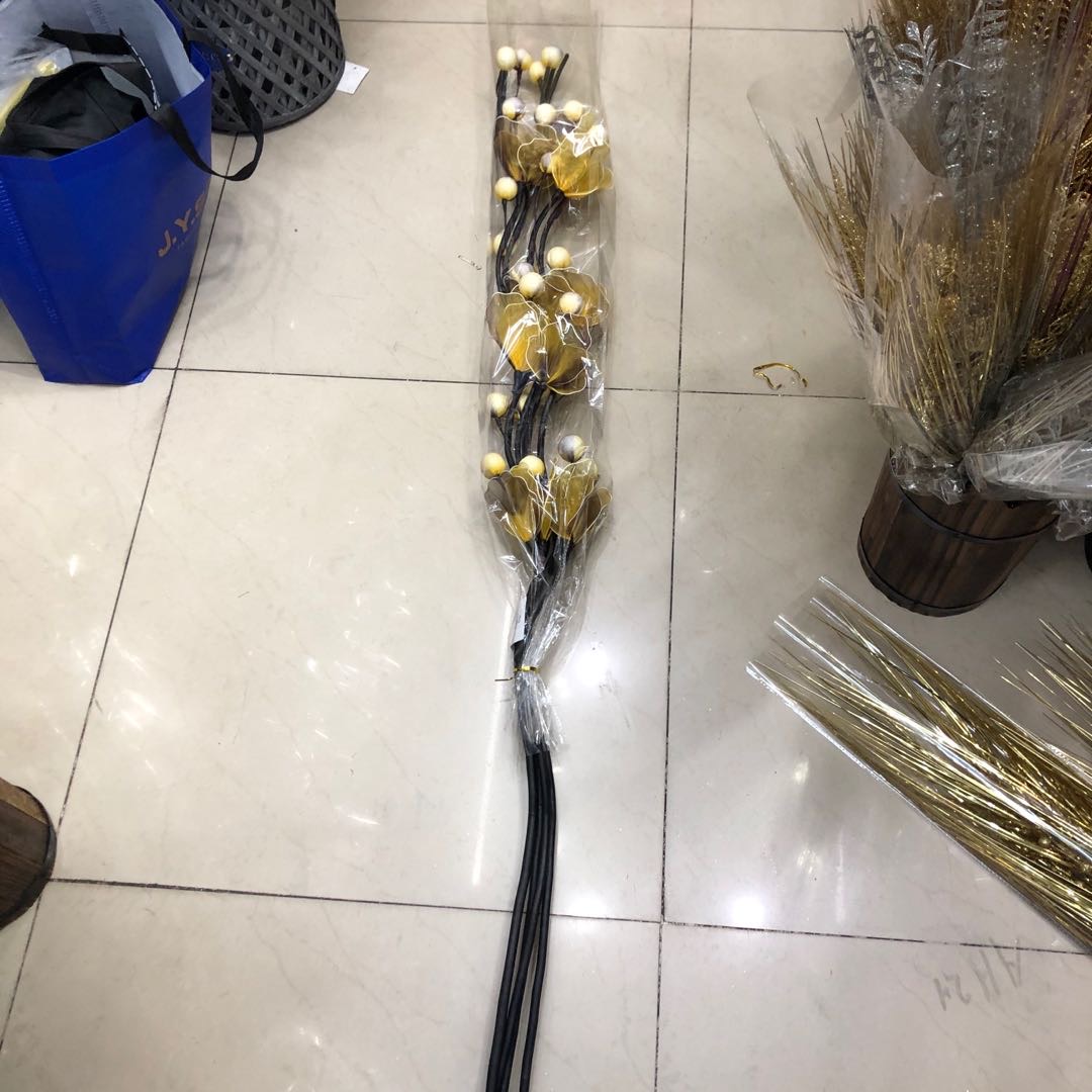 Large artificial flower pieces with flower stamens, yellow entrance hall ornaments, and artificial flower shooting props