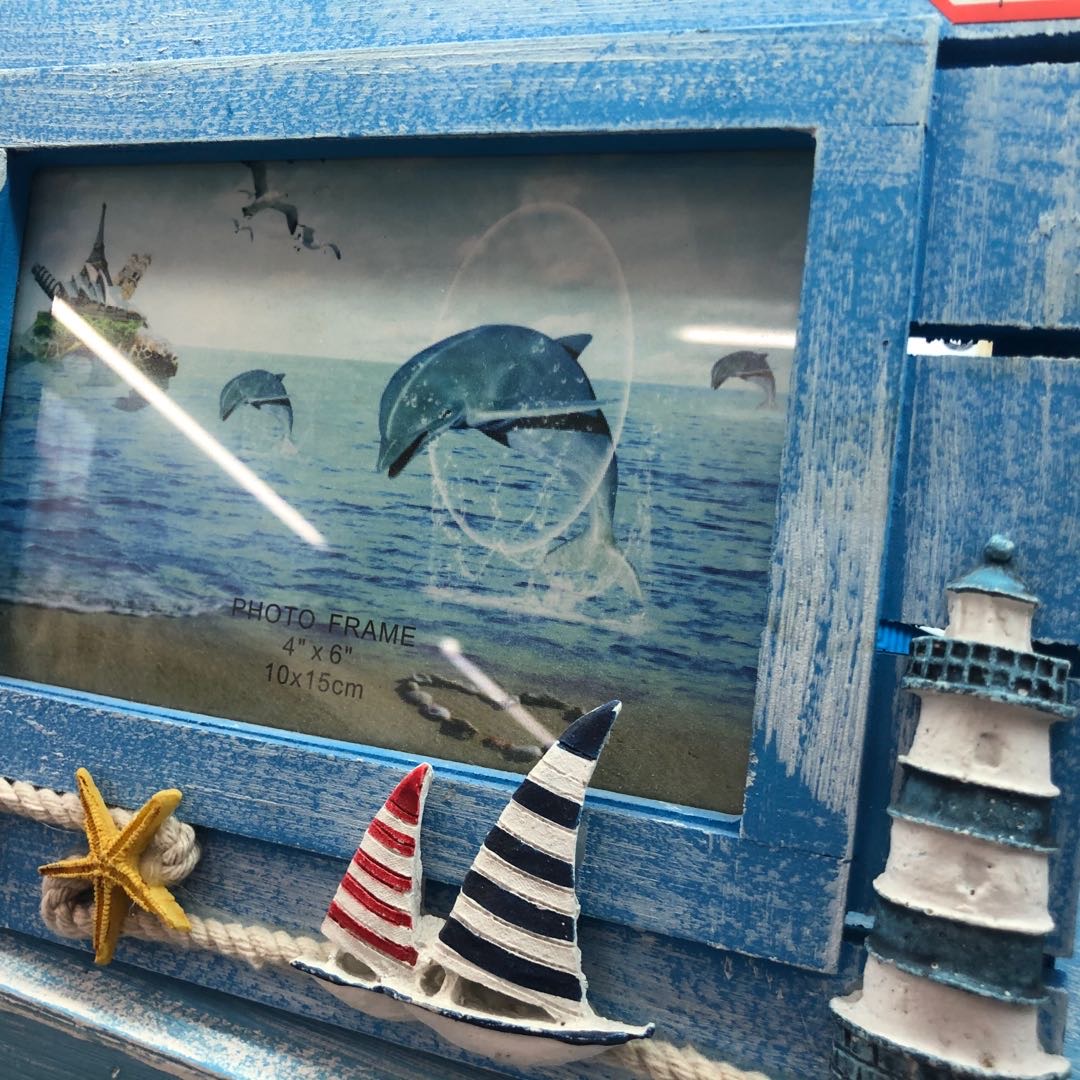 Deep blue Mediterranean-style swing photo frame decoration, creative boat-shaped image frame, ocean-style wooden sailboat display stand decoration photo frame details Picture