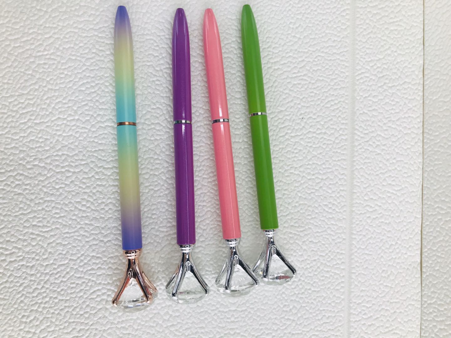 Overall view of a diamond metal ballpoint pen