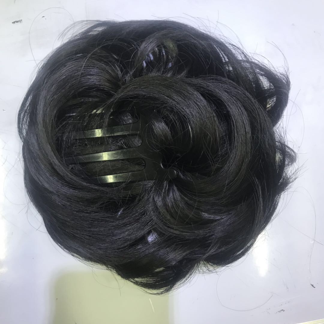A popular and fashionable black clipped ponytail wig made of chemical fiber for export details Picture