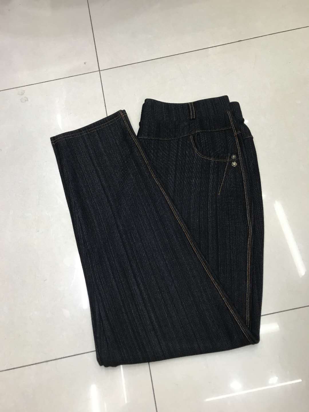 Women Wear Elastic Pants Over Casual And Comfortable Denim Leggings
