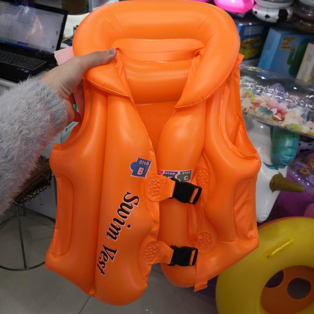Life jacket Yellow inflatable PVC swimsuit for children swimming in the water