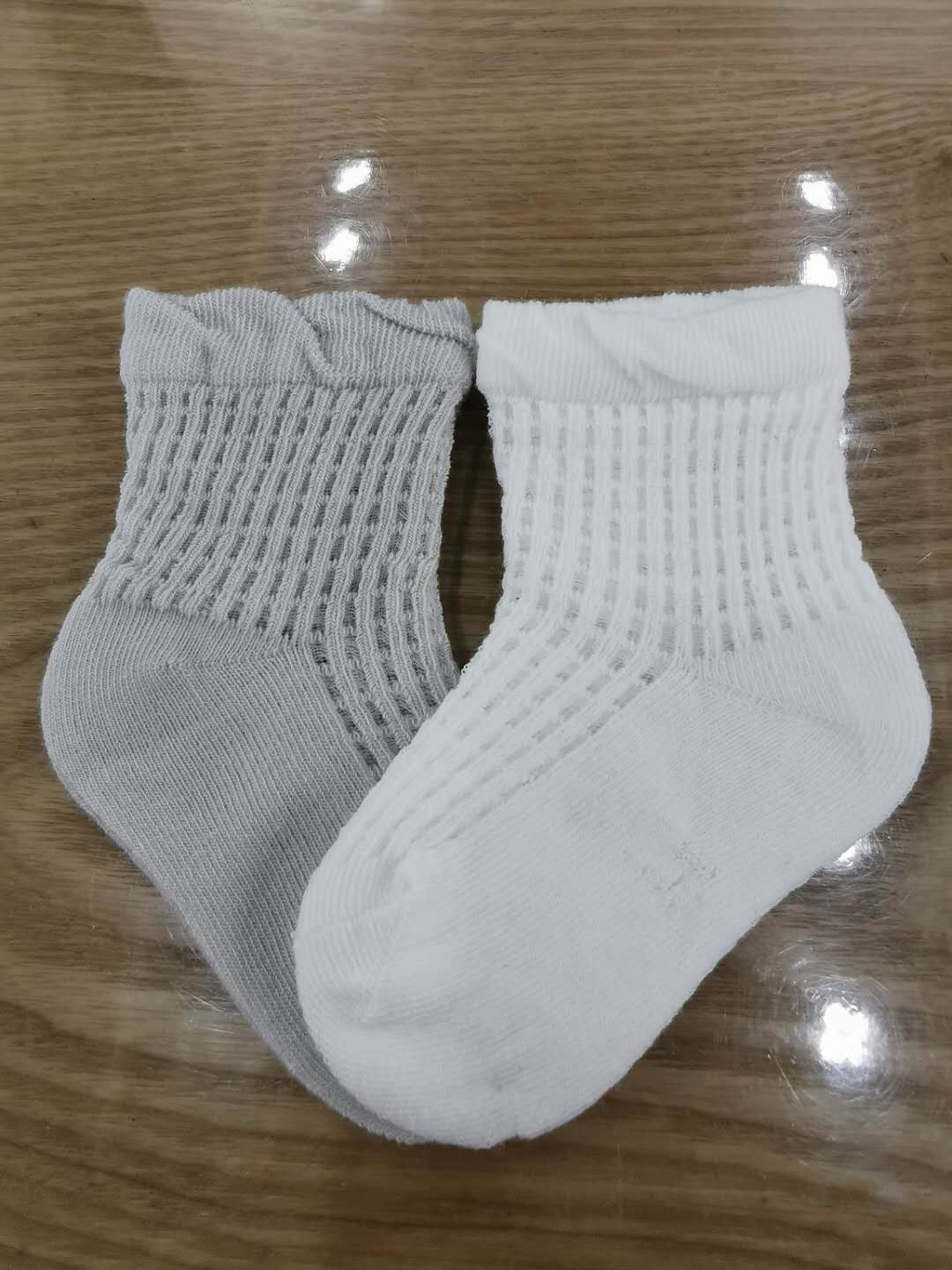 婴幼儿夏款网眼纯色松螺口精梳棉手工缝头产品图