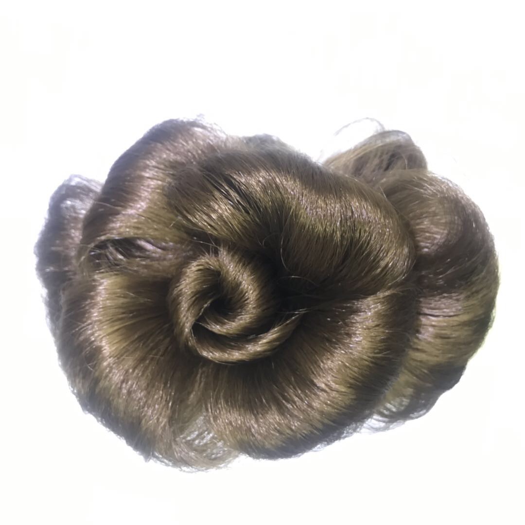 A synthetic fiber flower-shaped wig with a clipped ponytail accessory for ladies