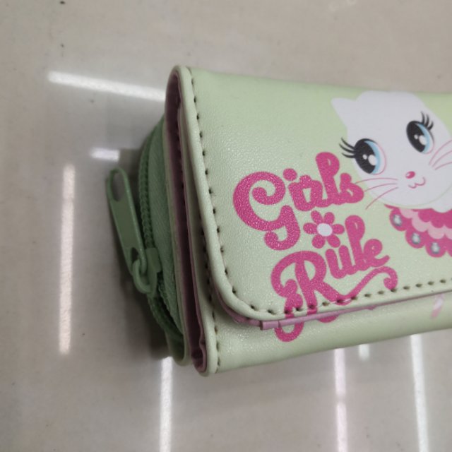 Green girls' wallet, zipper bag and clutch details Picture