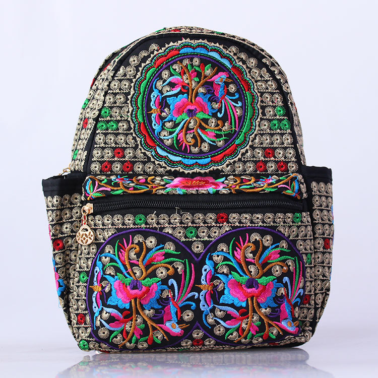 新款学生刺绣民族风绣花包包帆布女士书包背包双肩包