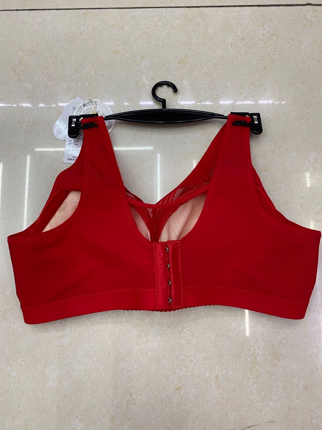 A large-sized lingerie for a plump girl weighing 200 pounds, gathered together, thin bra without underwire, bright red details Picture