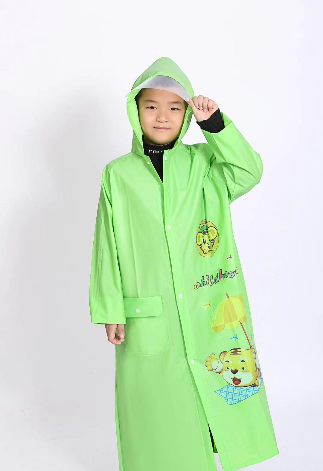 Children carry schoolbags and raincoats, cartoon pattern children's raincoats details Picture