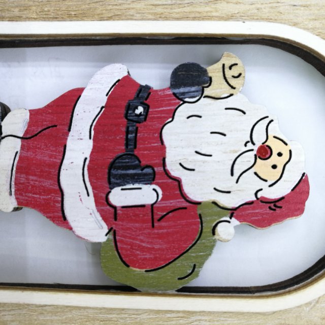 Children's gifts are hung on the wall in the style of Santa Claus in the room Specification image
