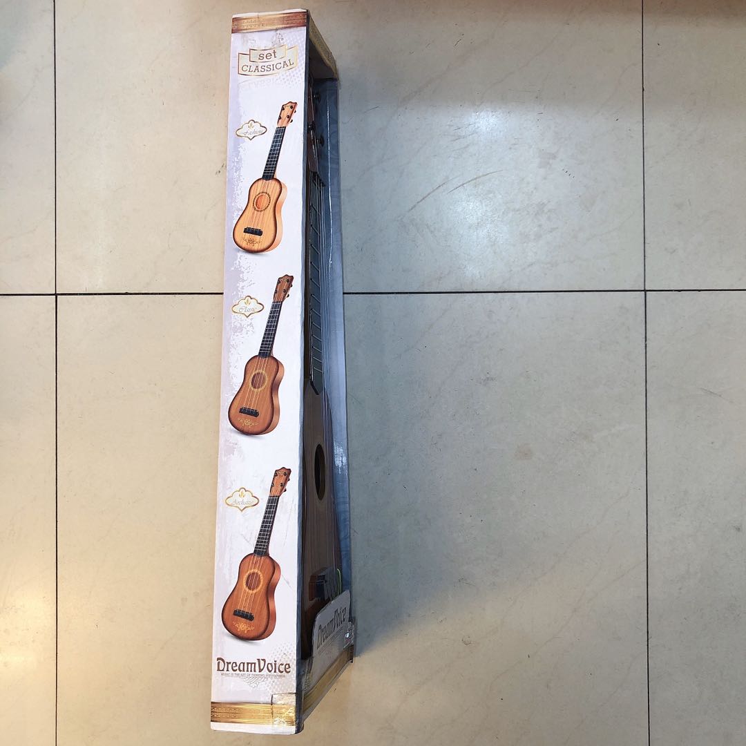 Simulated children's four-string small guitar toys, educational and educational Musical Instruments available for wholesale from manufacturers details Picture