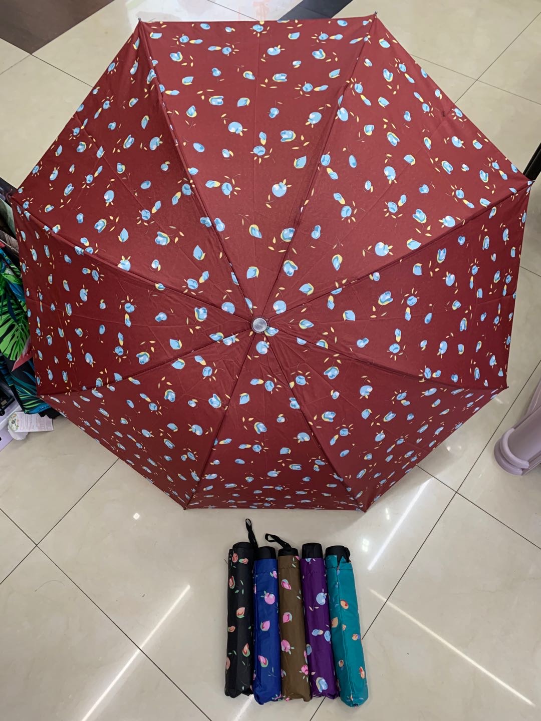 Portable three-fold umbrella with floral fringes for both weather and rain Specification image