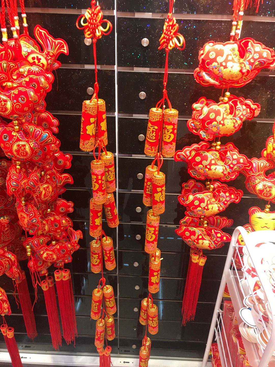 12 small firecracker tassels with "Fu" character prints