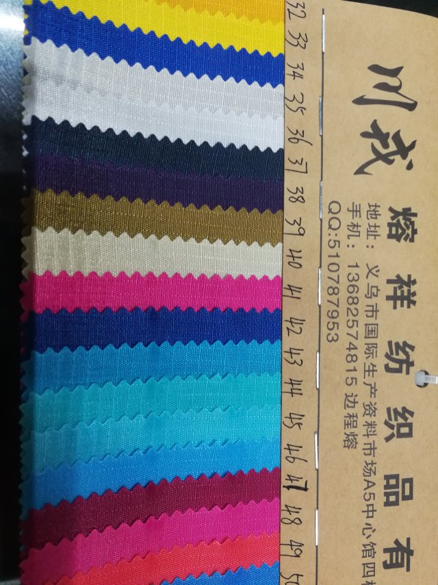 厂家直销热销新款格子布210d三分格皮革大量现货高中低档箱包沙发鞋材面料产品图