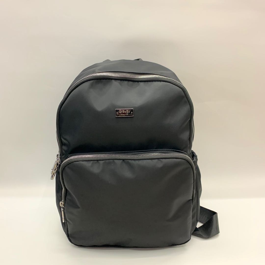 A pair of black women's washed nylon large-capacity backpacks for casual wear