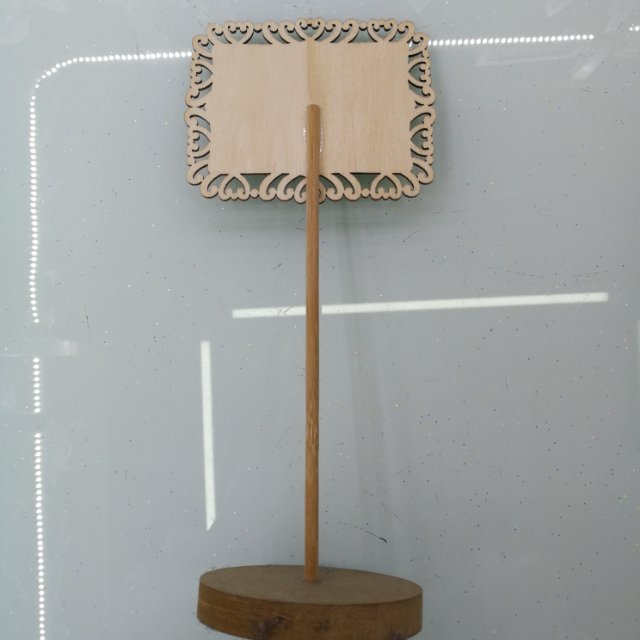 A small square wooden blackboard with hollowed-out heart-shaped decorative strips details Picture