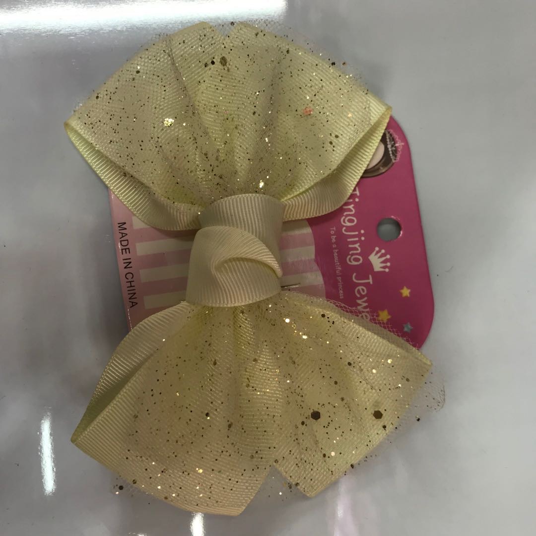Wholesale of ribbon bow mesh sequin duckbill clip headwear from the manufacturer