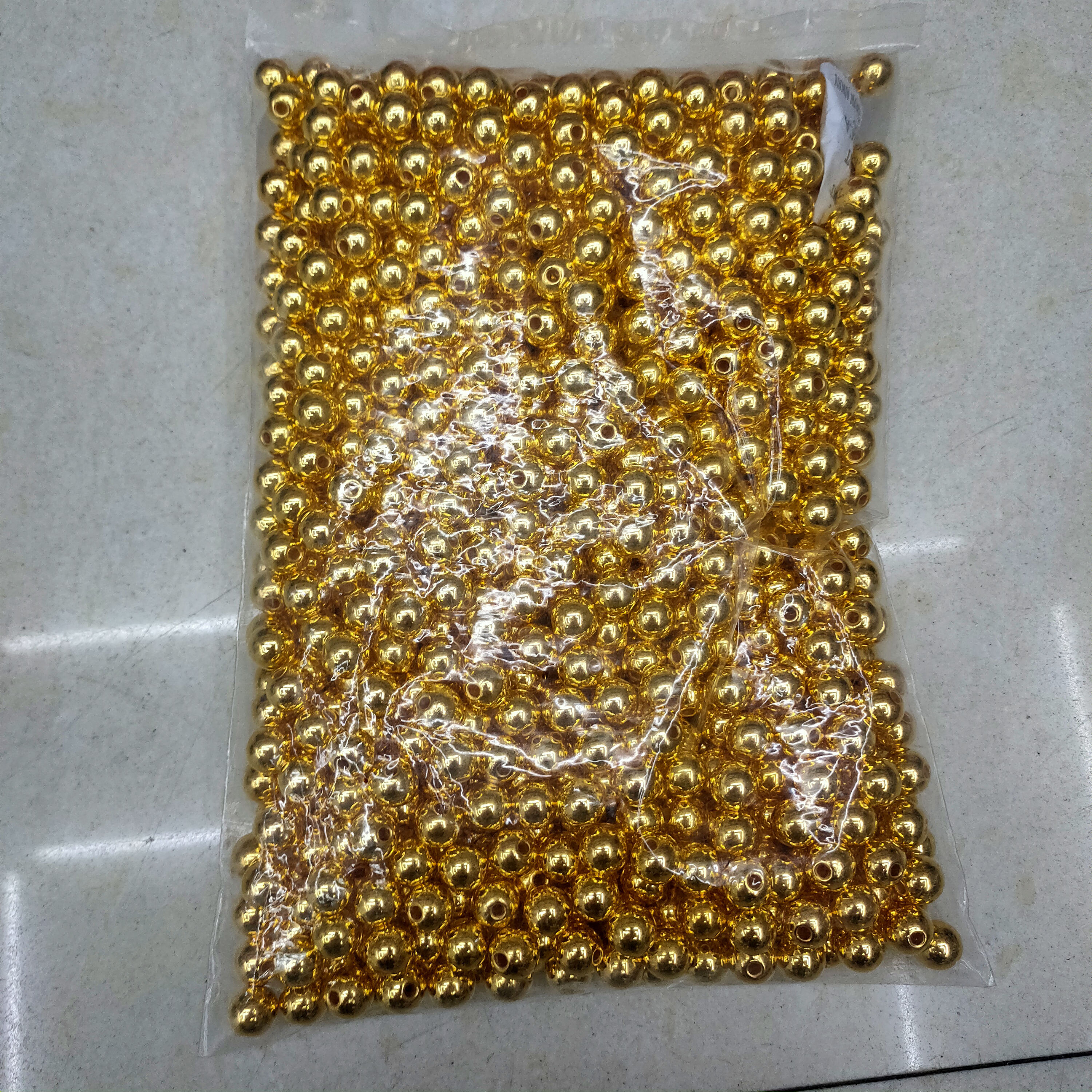 Wholesale of eco-friendly ABS perforated nail beads, gold electroplated clothing accessories, round beads, nail beads and beads