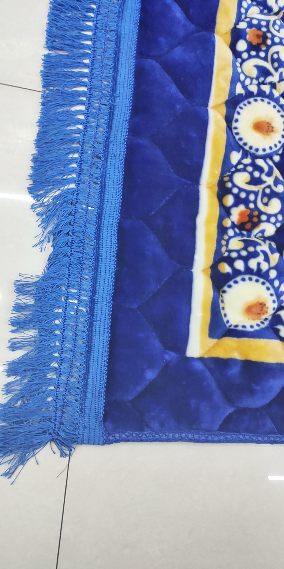 Mosque-inspired floor mat placed near entrance