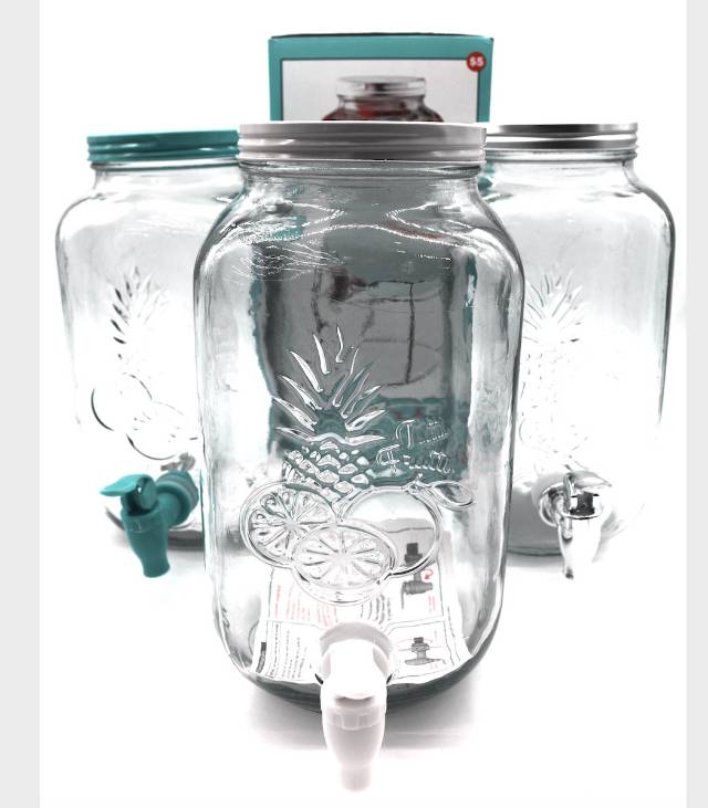 Juice dispenser with glass cover faucet