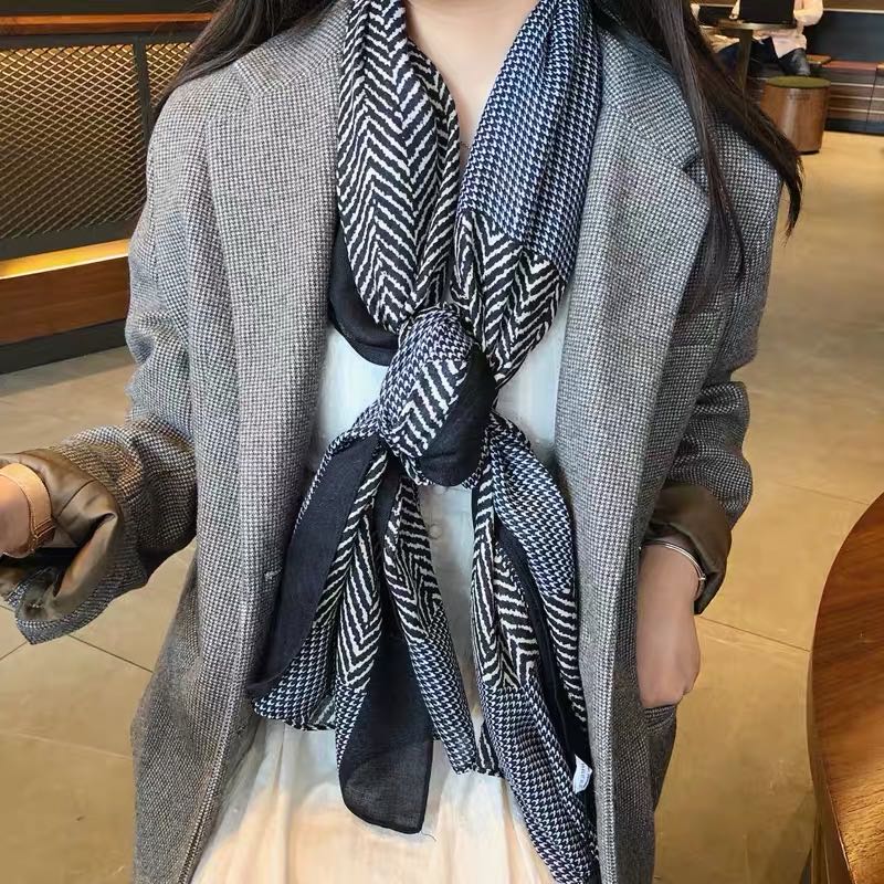 Dual-use long scarf styled in urban settings